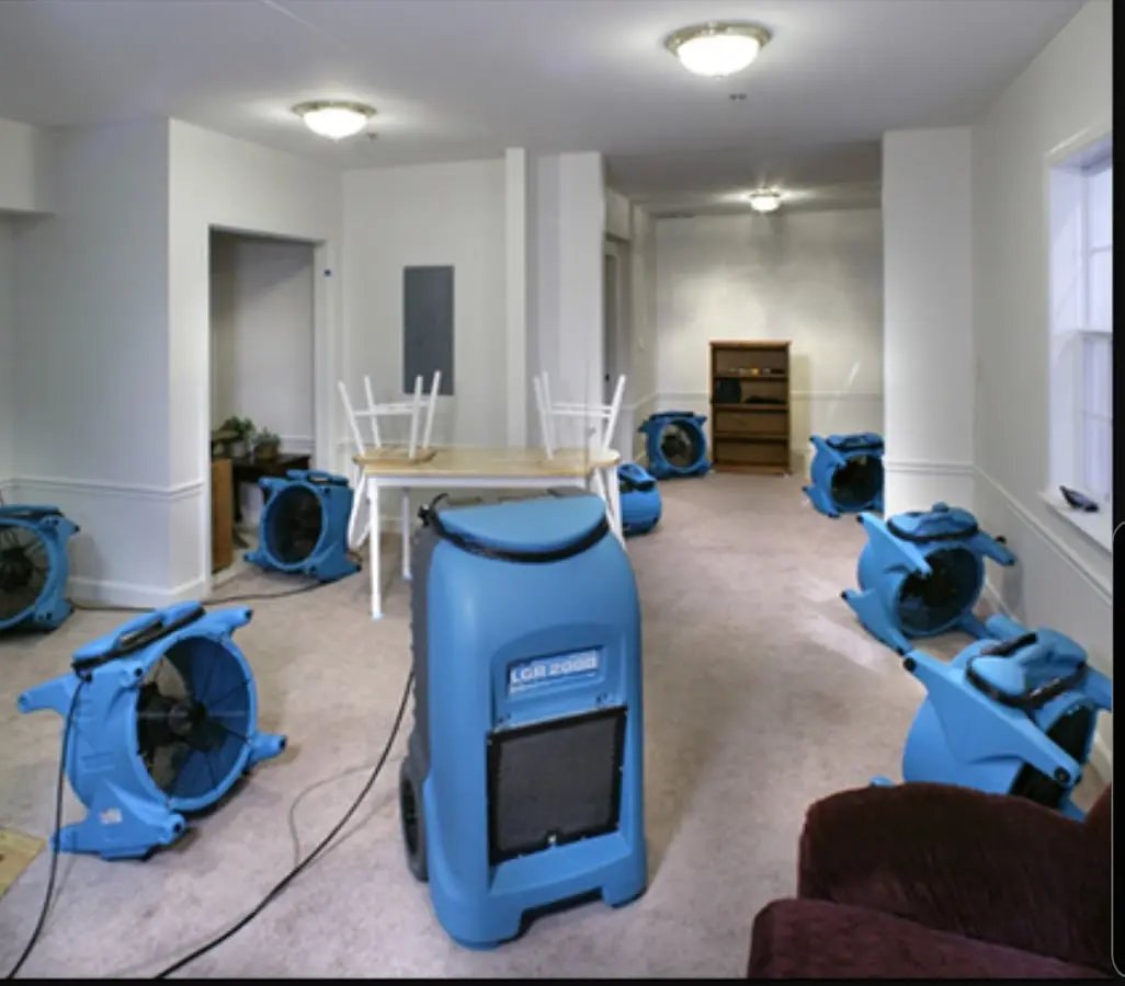 Air movers and dehumidifier setup for Water Damage Restoration in Mentone